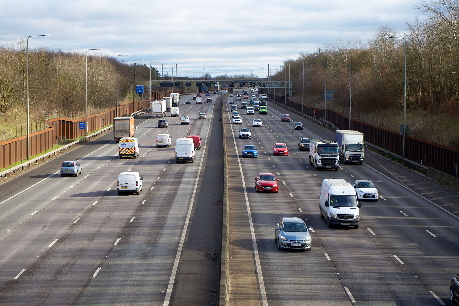Aerial view of vehicles on a busy highway outside St Albans, England during daytime.